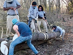 Agraria-NCCC-and-Gabby-moving-logs.jpg